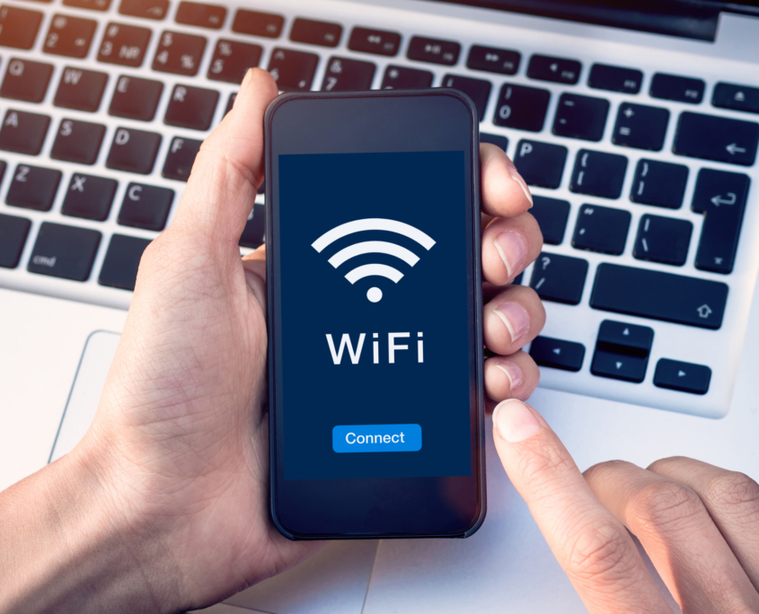 Connect to WiFi wireless internet network with smartphone at coffee shop or hotel with button on mobile device screen, free public hotspot secure access to web for email and website browsing Digital Signage